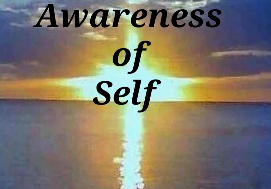 A poster of awareness of self with a sunset in the back